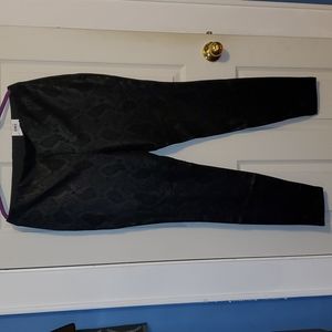 Black, snake print skinny leg pants